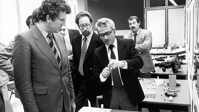 German Minister for Research and Industry Dr. Volker Hauff (left) visiting Feldmühle AG Dr Dörre (right)