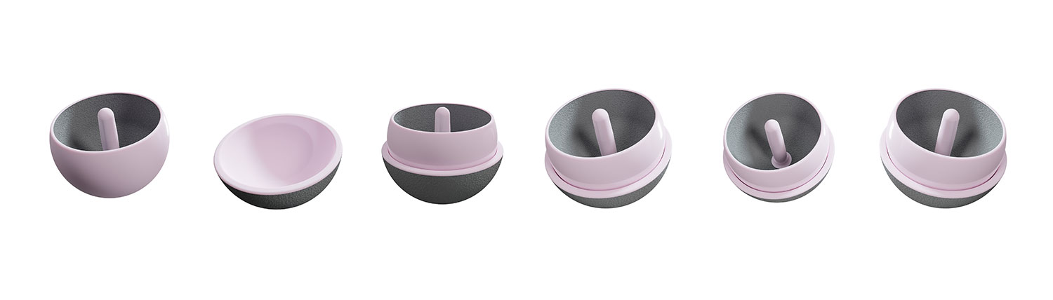 Multiple views of ceramic hip resurfacing components showing femoral and acetabular implants with fixation features.