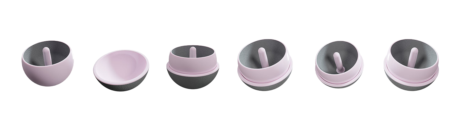Multiple views of ceramic hip resurfacing components showing femoral and acetabular implants with fixation features.